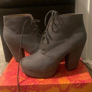 Gray size 7.5 ankle boots. Boots come with box.